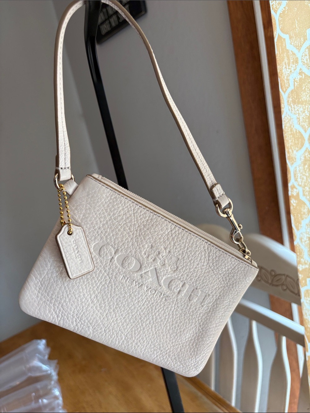 Coach Cream pebbled leather wristlet